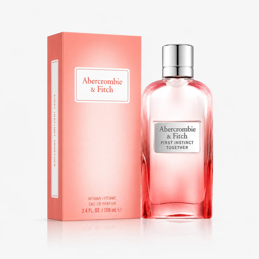 Abercrombie & Fitch First Instinct Together Eau de Parfum 100ml – 100 ml bottle beside its coral box