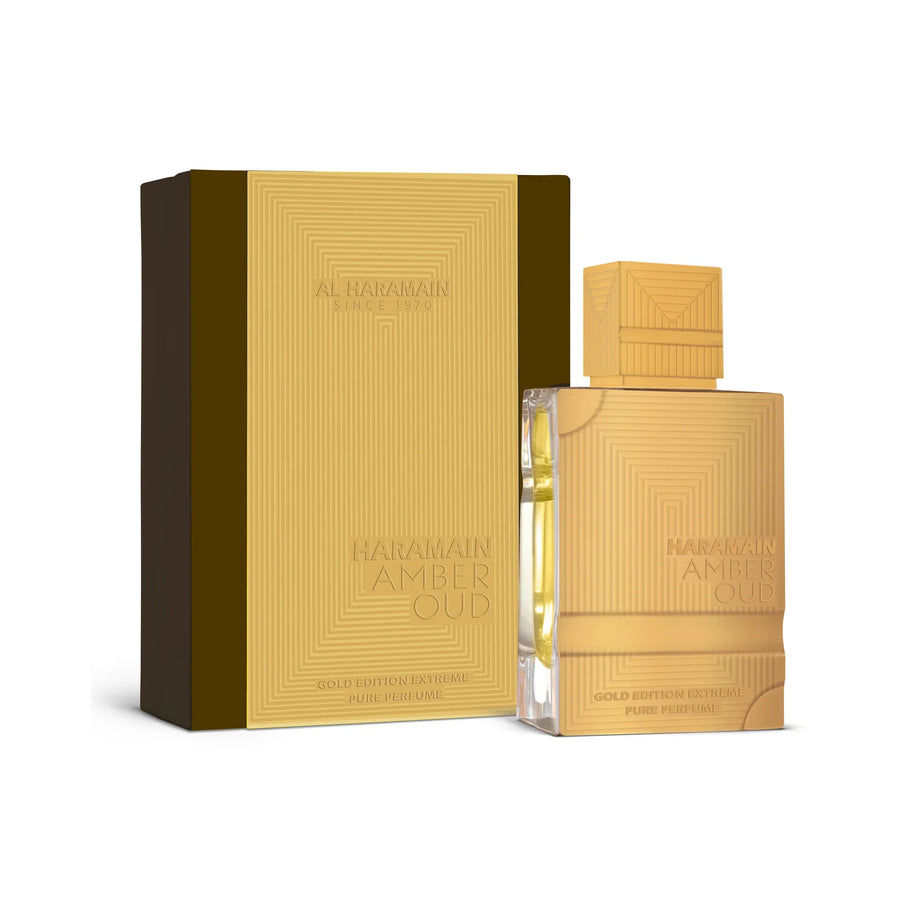 Al Haramain Amber Oud Extreme Gold Edition Extrait de Parfum – bottle beside its gold and brown box