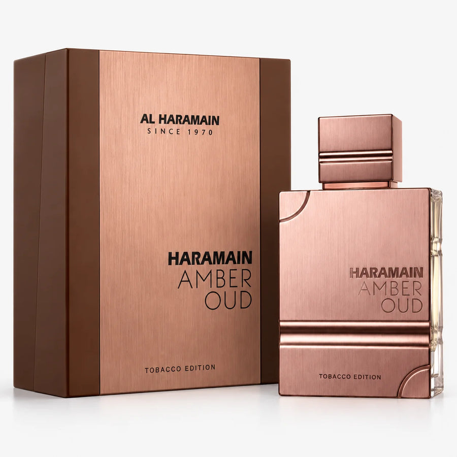 Al Haramain Amber Oud Tobacco Edition Eau de Parfum 60ml – bottle beside its brown and copper box