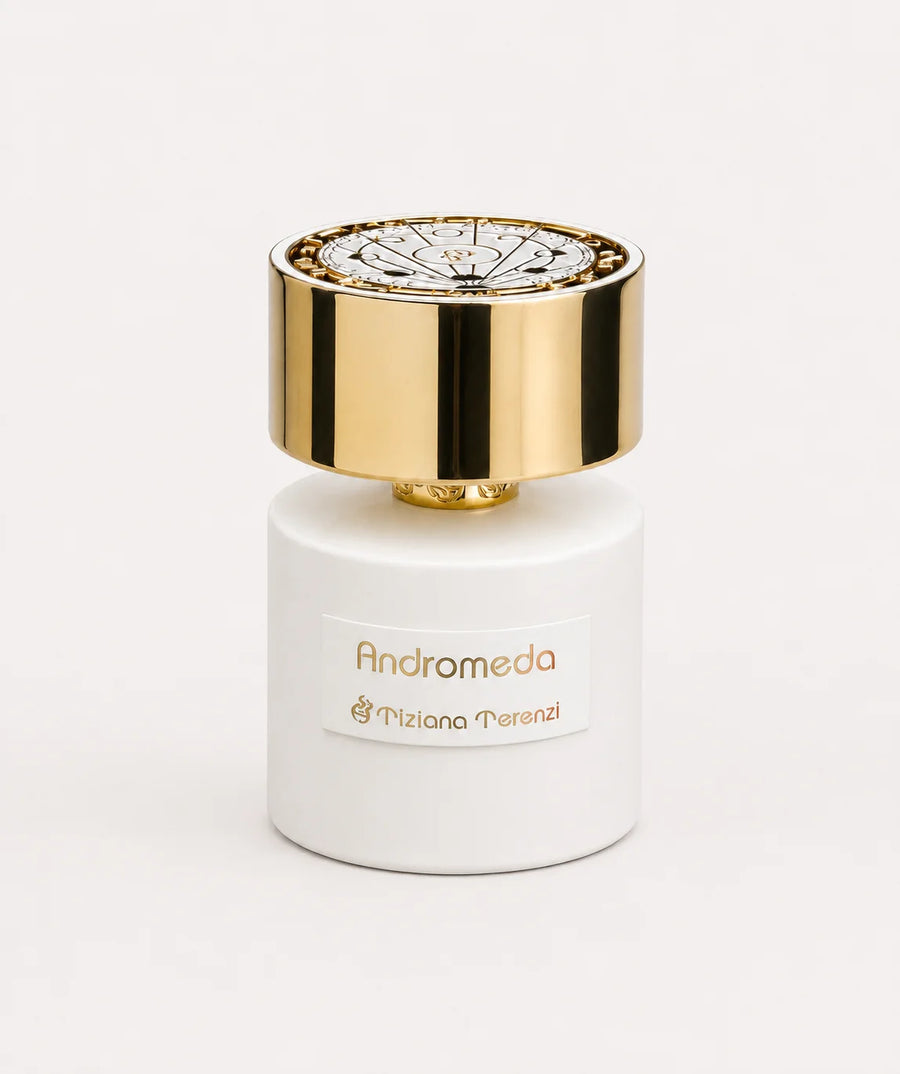 Andromeda Extrait de Parfum 100ml – white bottle with gold cap on a pale background