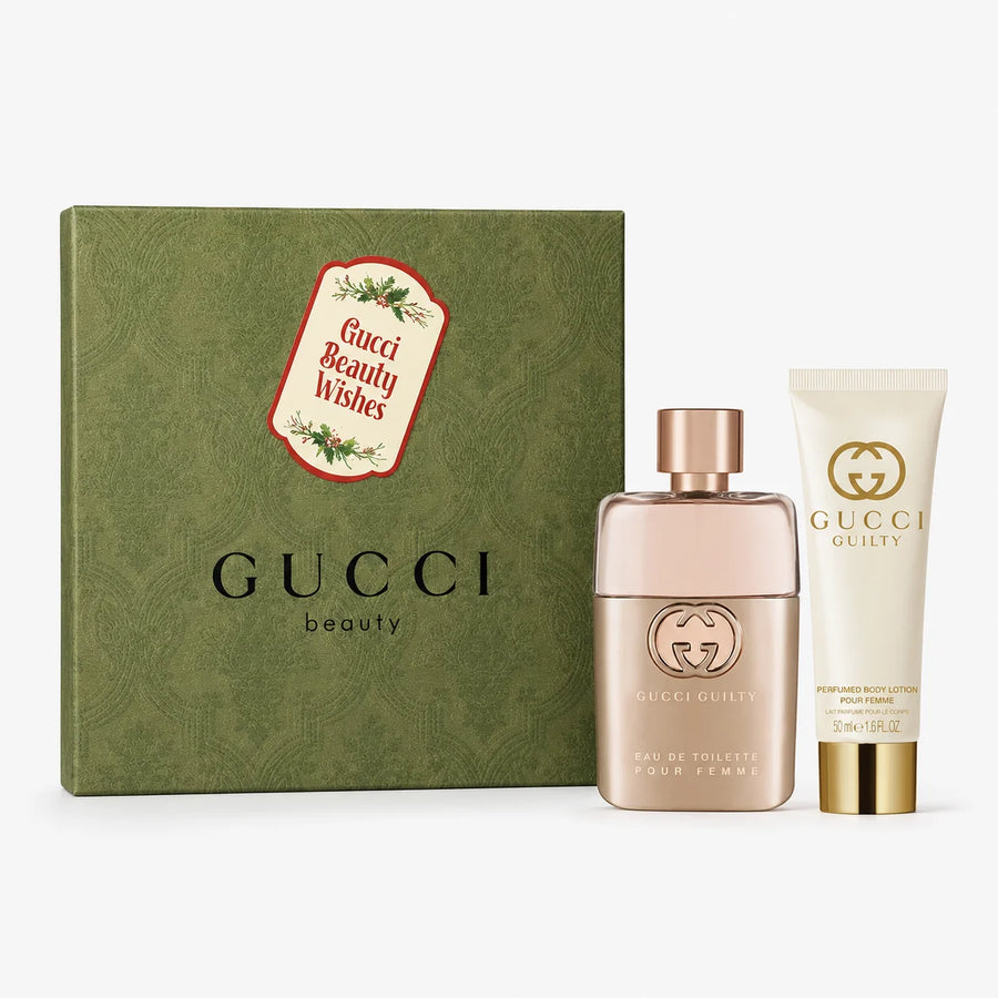 Gucci Guilty Pour Femme Eau de Parfum Gift Set 50ml + Body Lotion 50ml – perfume and lotion in front of green gift box