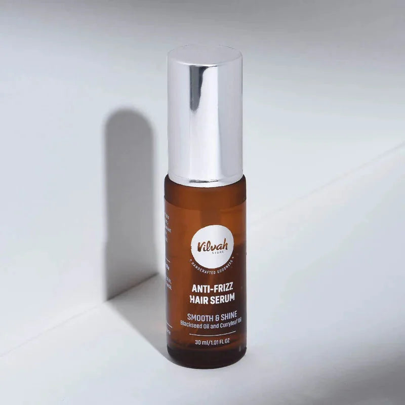 Vilvah Anti-Frizz Hair Kit – amber serum bottle with silver cap on white