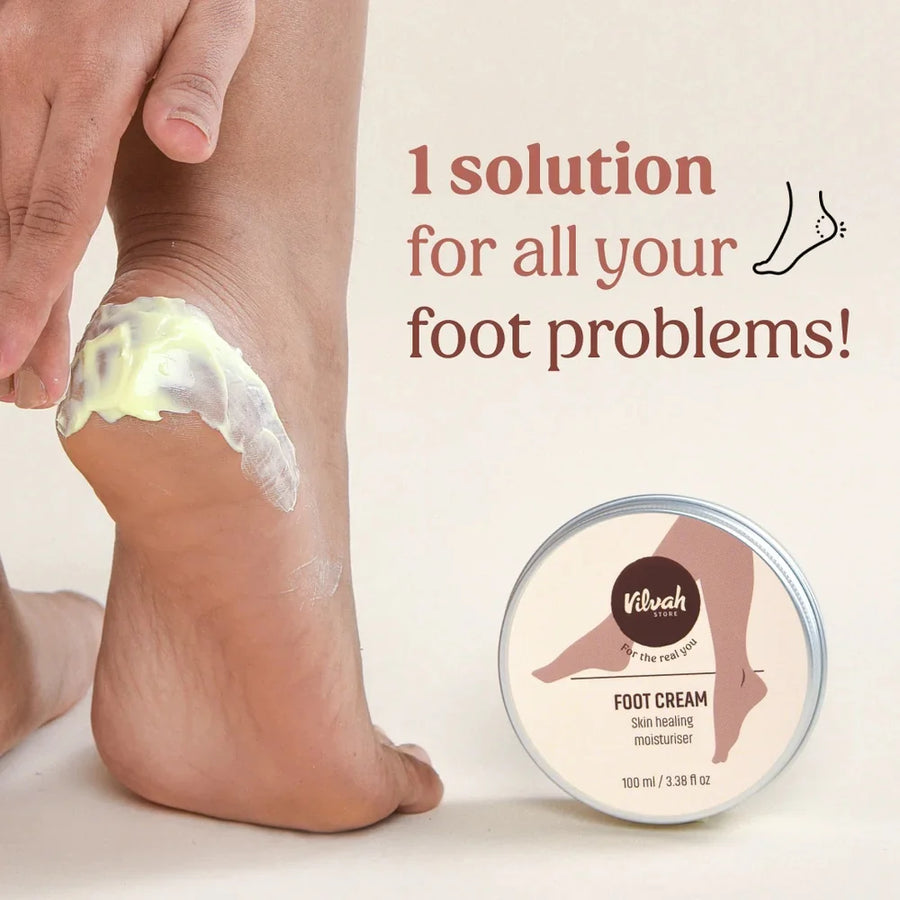 Vilvah Foot Care Cream 100ml – cream applied to a heel, with the tin beside the foot