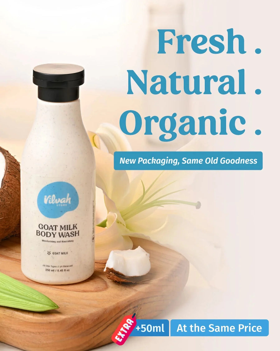 Vilvah Goat Milk Body Wash 200ml – bottle with coconut and lily on a wooden board