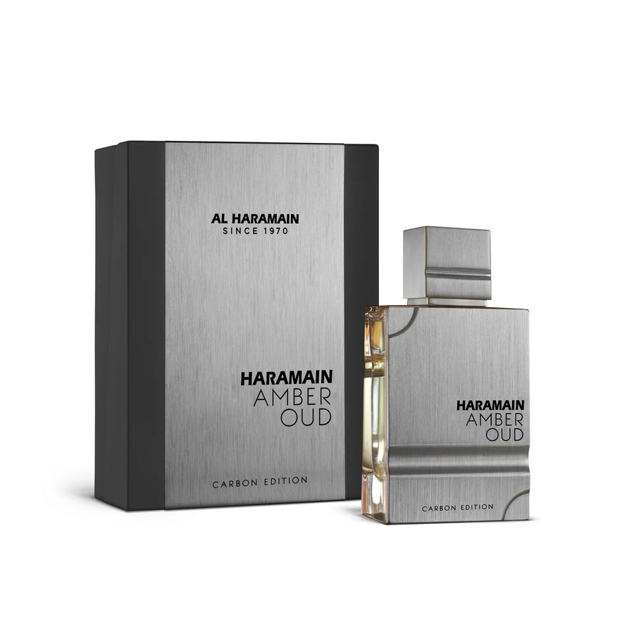 Al Haramain Amber Oud Carbon Edition Eau de Parfum – bottle beside its grey and black box