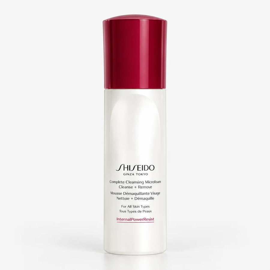 Shiseido Complete Cleansing Microfoam 180ml – white bottle with red cap, front view