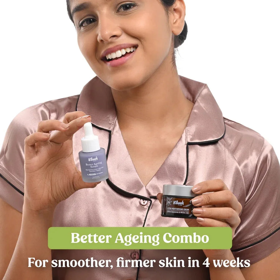 Vilvah Better Ageing Kit – model holding the serum and the cream jar